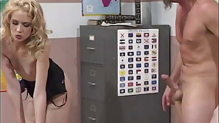 Blonde in sexy lingerie and biker dude fuck on a desk